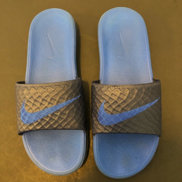blue and black nike slides